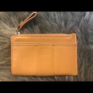 Tan leather Coach coin purse